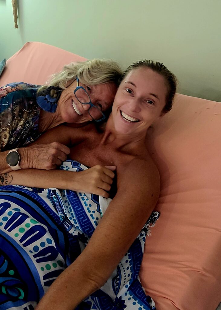 picture of Ali and mom in bed together :-)